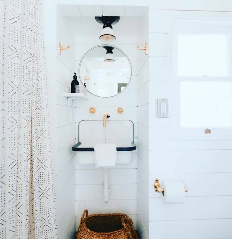 Small Powder Room With Shiplap Walls and a Retro Sink