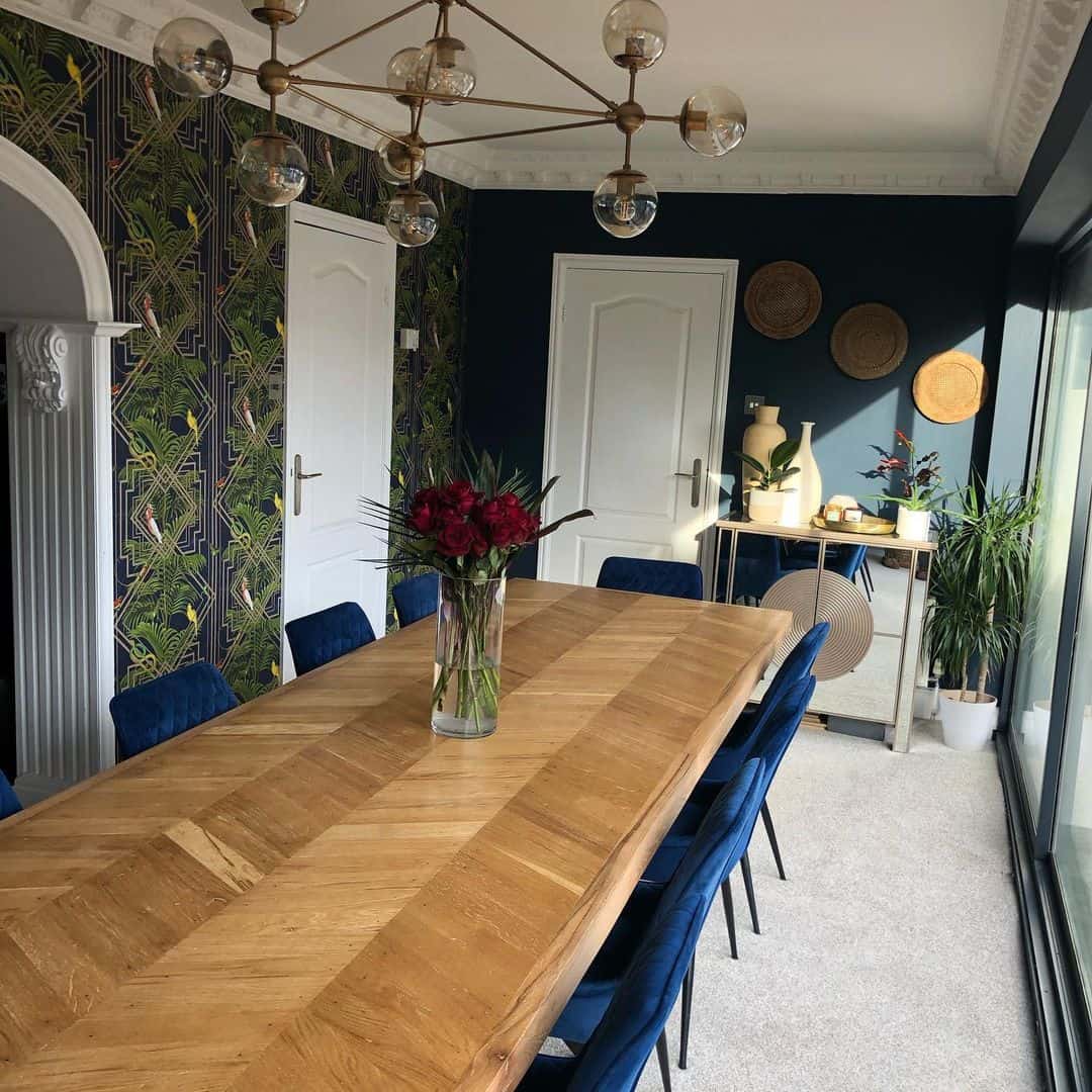 Spacious Navy Blue Dining Room With Accent Wall - Soul & Lane