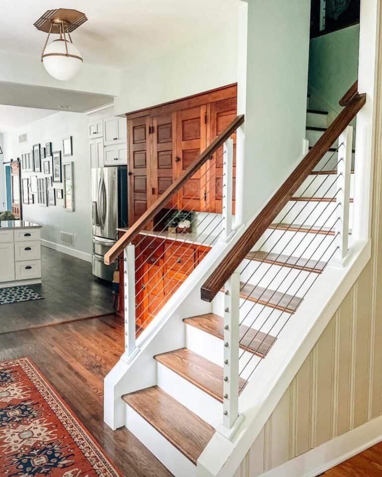 Two-toned Stairway With Cable Railing