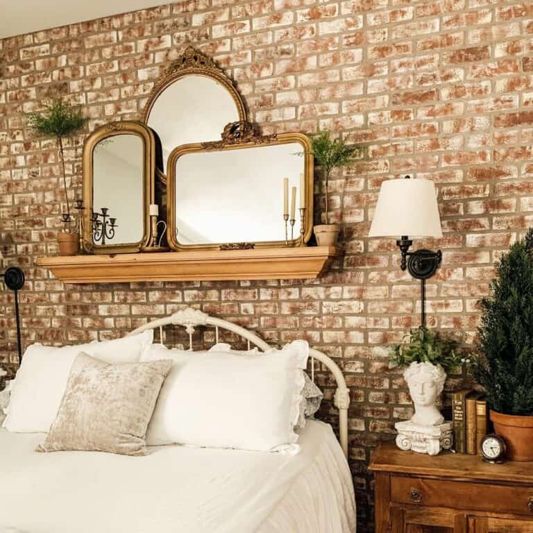 Vintage Mirrors on a Bedroom Brick Wall