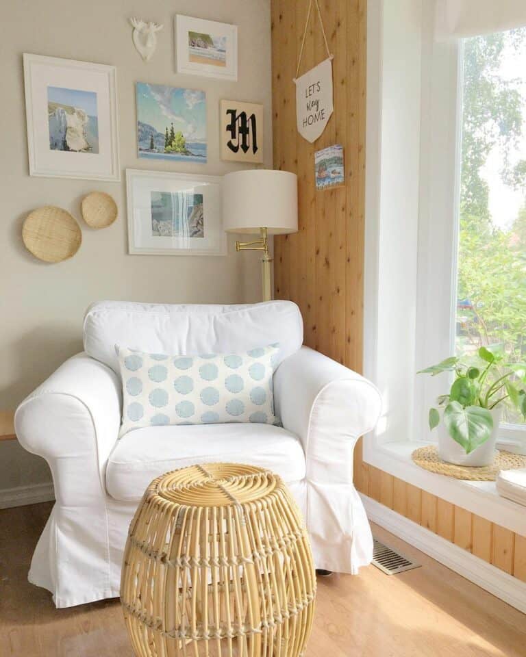 White Armchair and Rattan Stool in Living Room