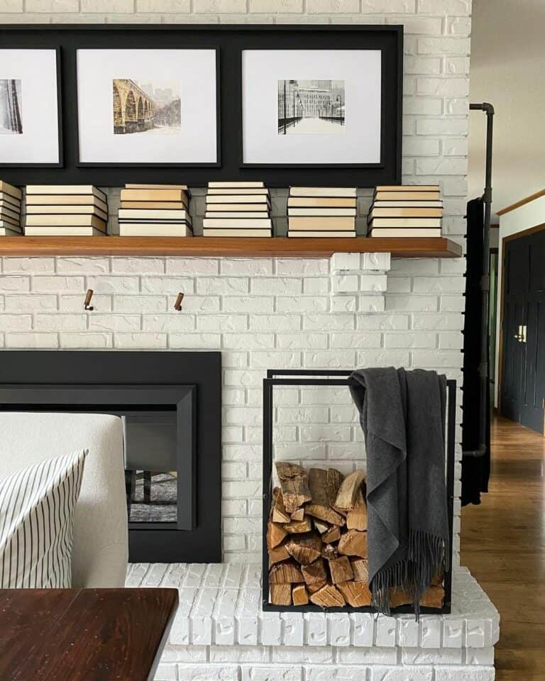 White Brick Fireplace With Black Photo Display