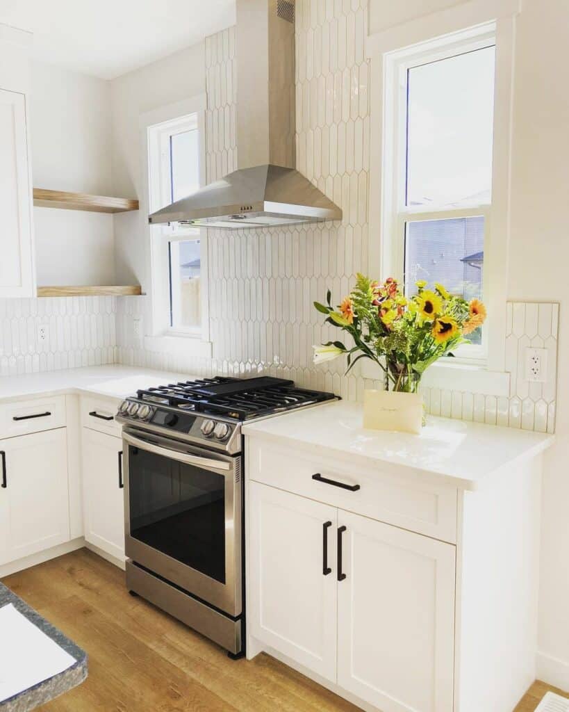 White Cabinets With Elongated Hexagon Tile Backsplash