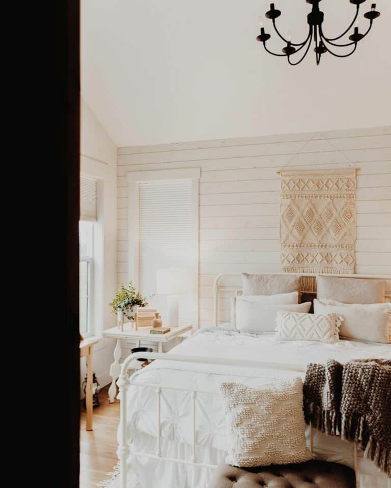 White Farmhouse Bedroom With Macramé Décor