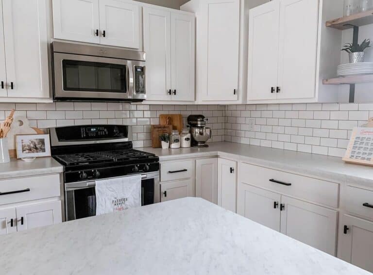 White Farmhouse Kitchen With Subway Tile Backsplash