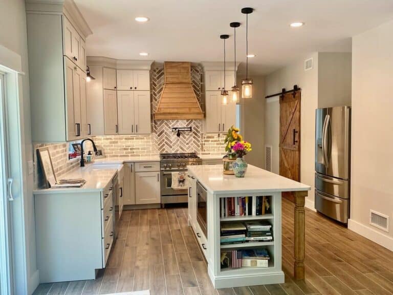 White Farmhouse Kitchen With Suspension Lamps