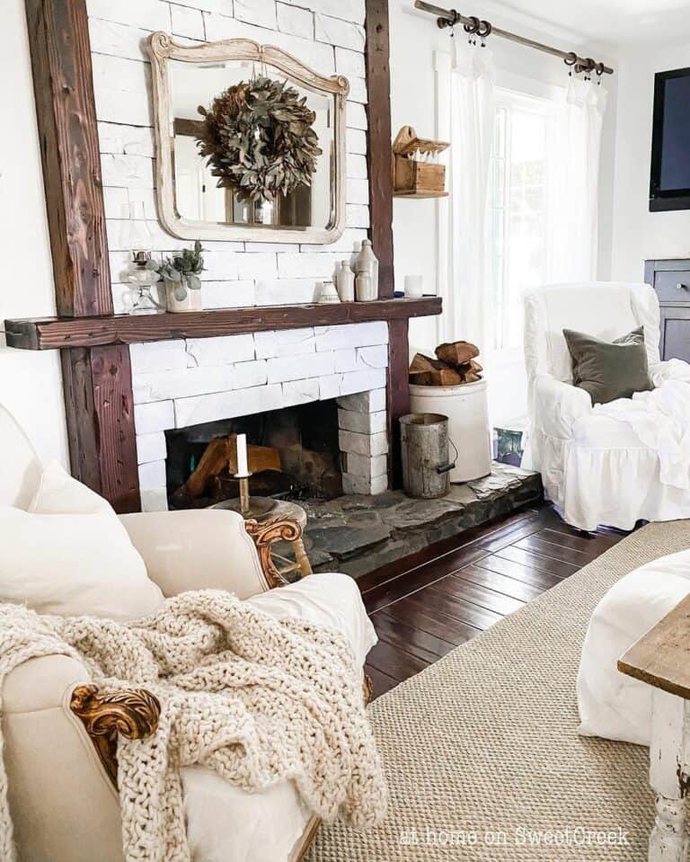 White Farmhouse Living Room With Dark Wood Finishes