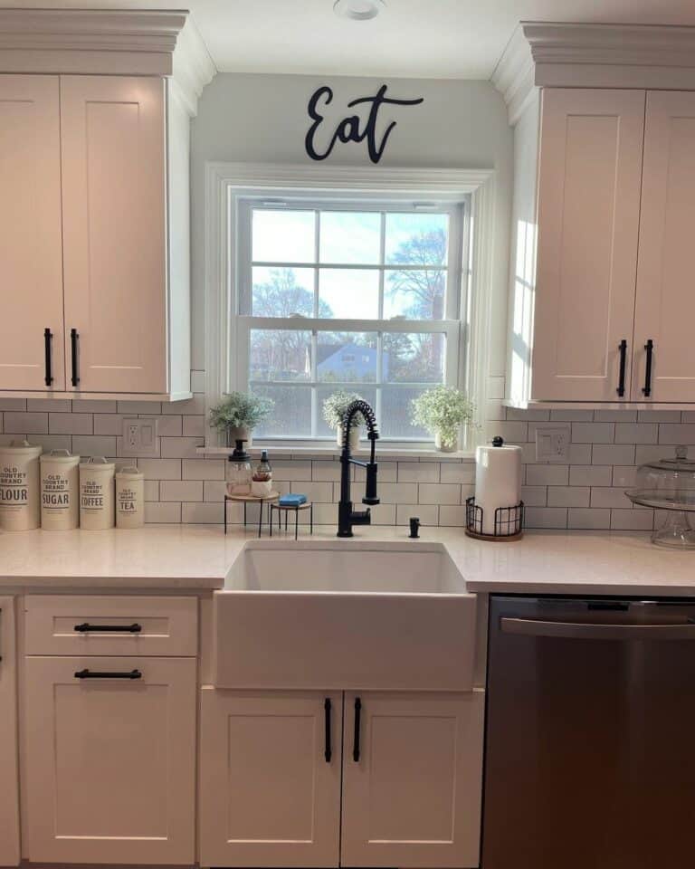 White Farmhouse Sink Kitchen With Wall Décor
