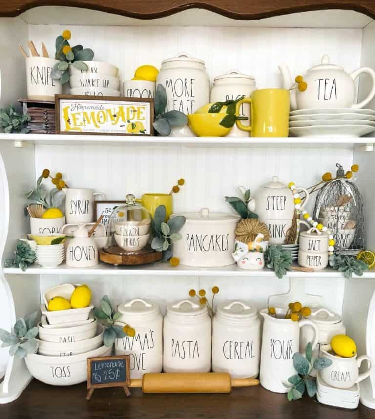 White Hutch With Kitchen Canisters and Lemons