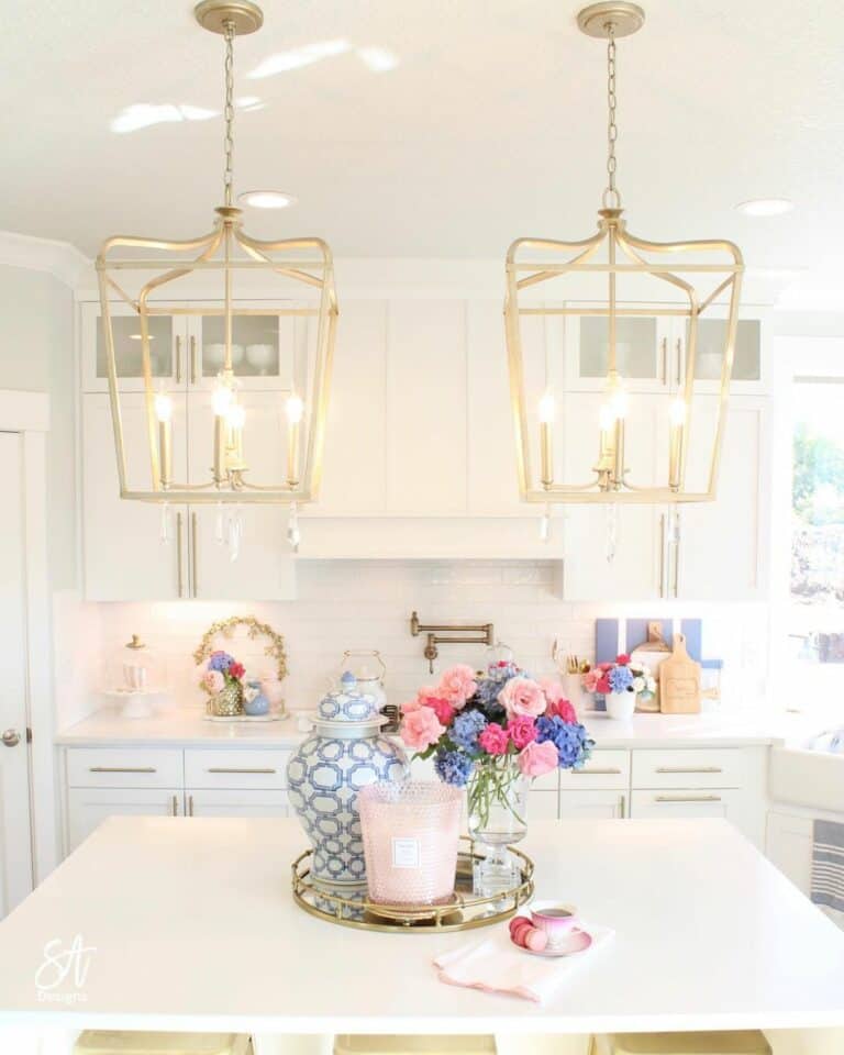 White Kitchen With Gold Lantern Pendant Lights