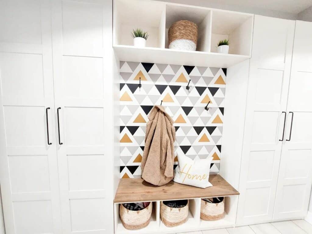 White Laundry Cabinets With Geometric Wallpaper