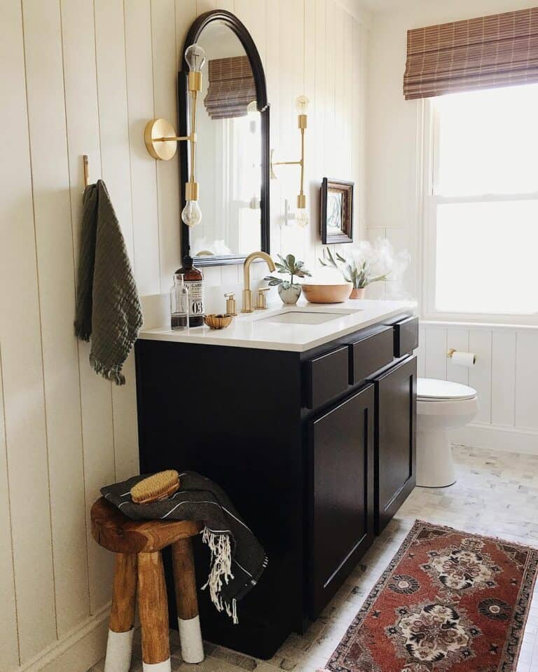 White Shiplap Walls With Black and White Vanity