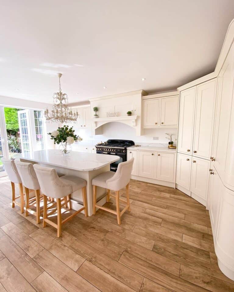 Wood Flooring and Creamy White Kitchen Cabinets