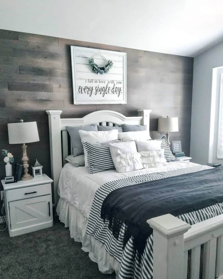 Wood Shiplap Accent Wall With Blue and White Bed