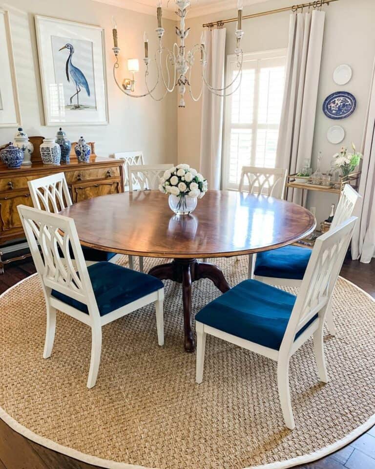 Grand Millennial-style Dining Room With Blue Accents