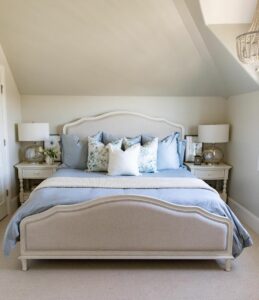 Blue and White Bedding in Vaulted Farmhouse Bedroom