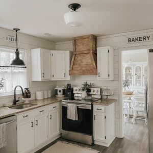 White Farmhouse Kitchen With Shiplap Walls