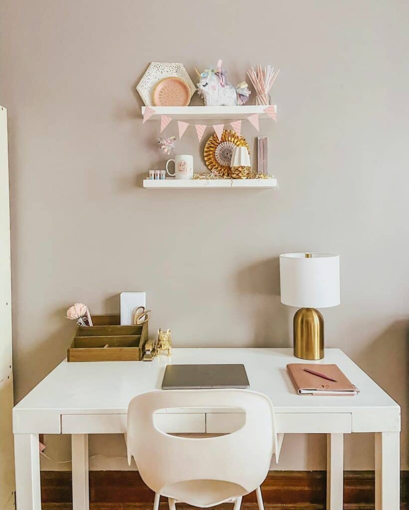 Adorable Desk Space With Pink and Brass Accents
