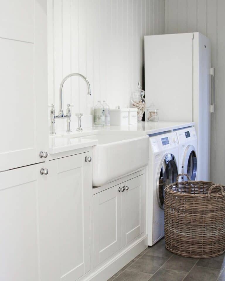 All-white Laundry Room With Apron Sink