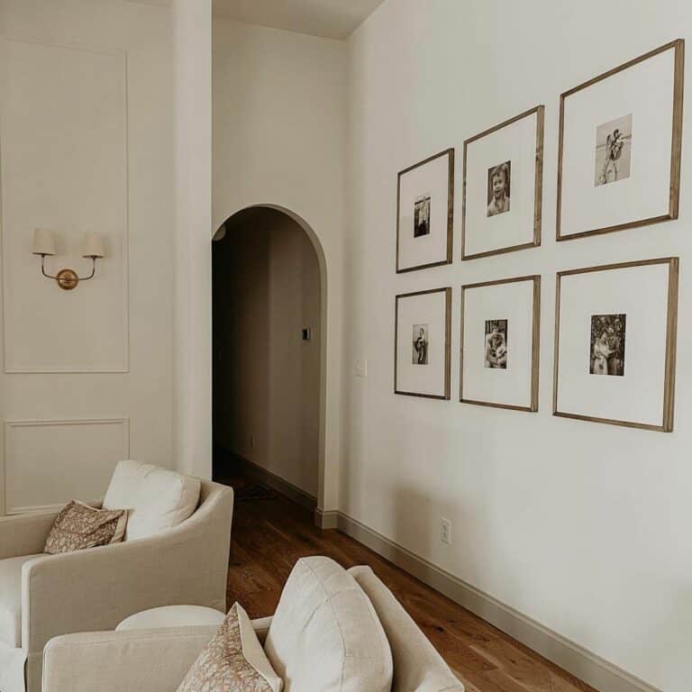 Archway Leads Into a Minimalist Living Room