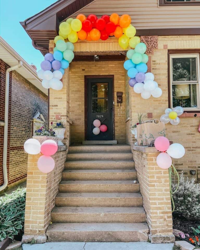 Balloons Arched Over a Walk-up Porch