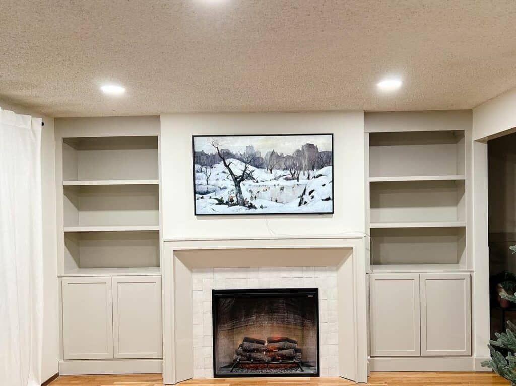 Beige Built-in Shelves Around a Fireplace