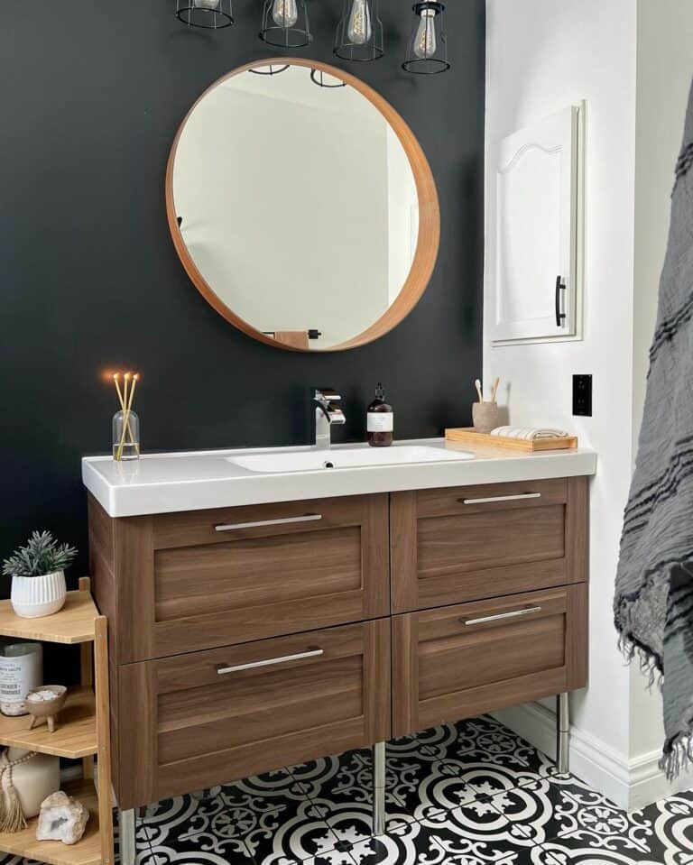 Black Accent Wall and a Wooden Vanity