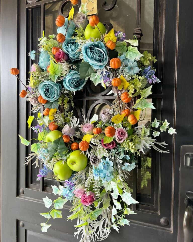Black Door With Colorful Green Apple Wreath