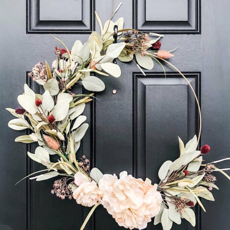 Black Door With Gold Hoop Autumn Wreath