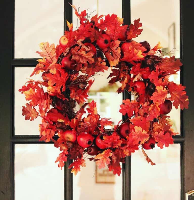 Black Door With Red Crabapple Wreath
