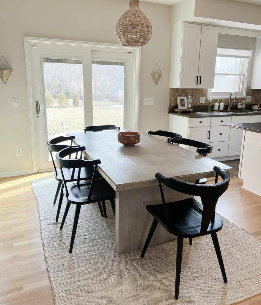 Black and Wood Dining Room With Matching Kitchen