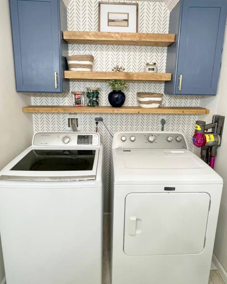 Blue Cabinets With Wood Floating Laundry Shelves