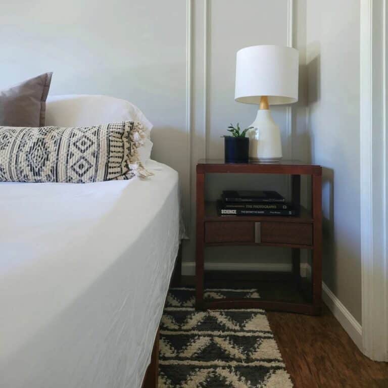 Boho Bedroom With Dark Wood Nightstand