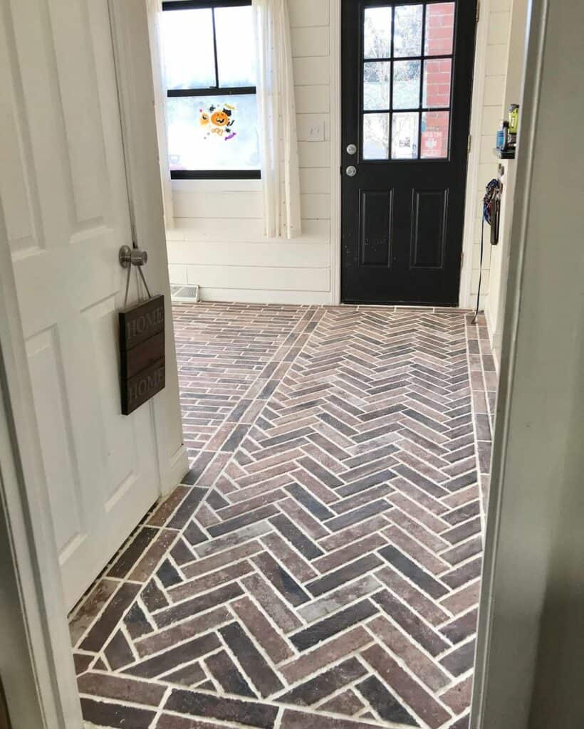 Brick Flooring Paired With White Shiplap