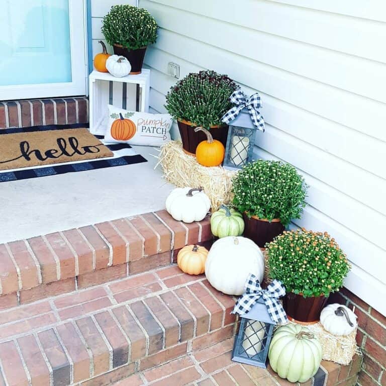 Brick Porch Steps Decorated With Fall Décor
