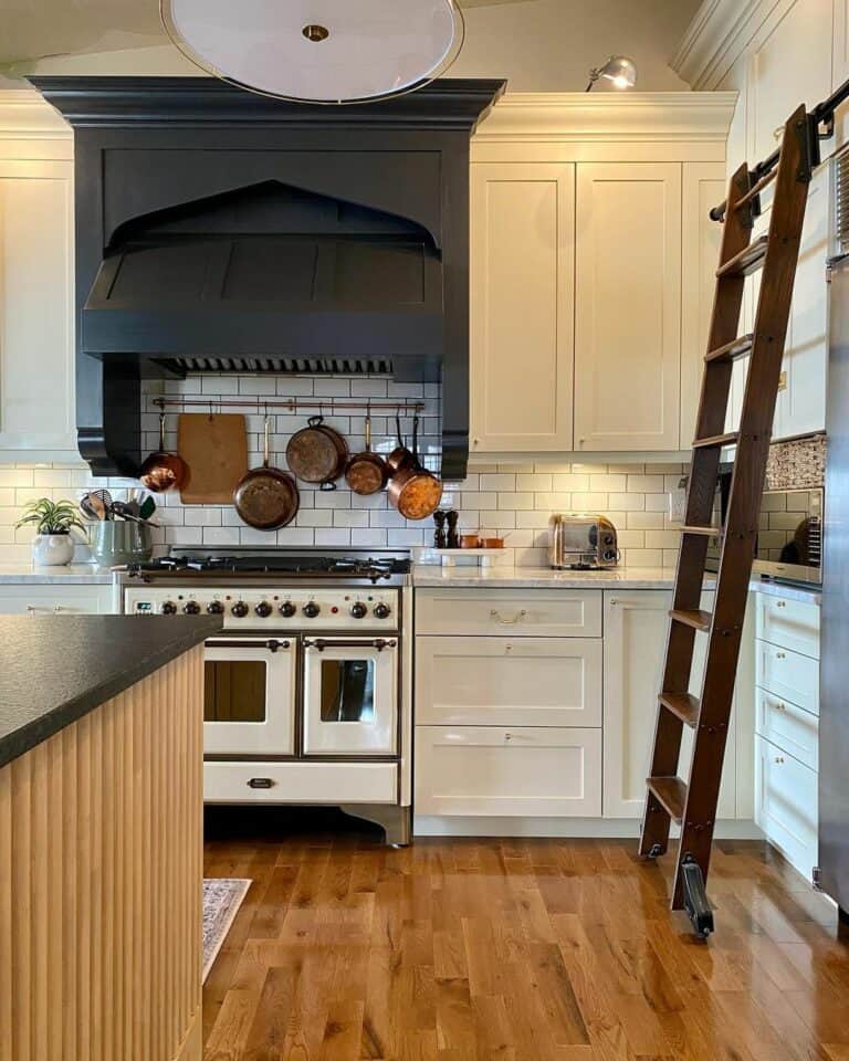 Classic Kitchen With Contrasting Hood Vent