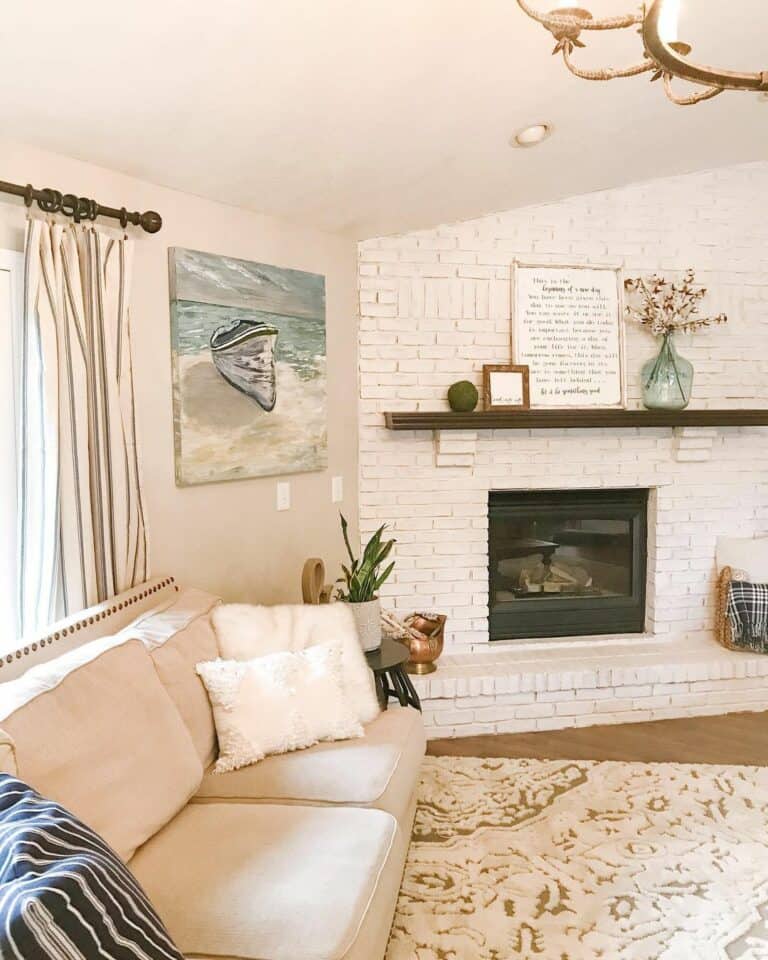 Coastal Living Room With White Brick Fireplace