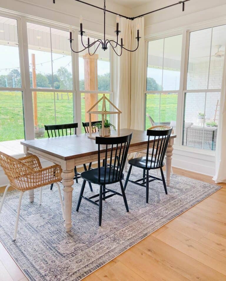 Cottage Dining Room With White Curtains
