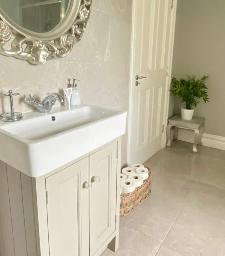 Cottage House Bathroom With Gray Washstand