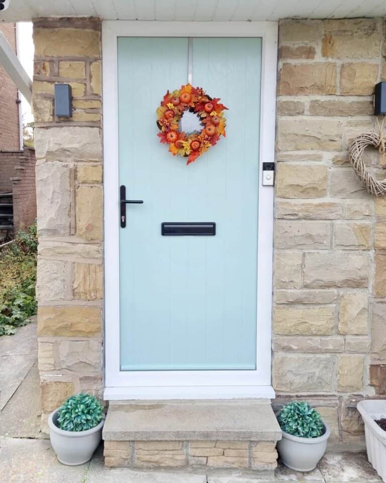 Cottage Porch With Pastel Blue Door