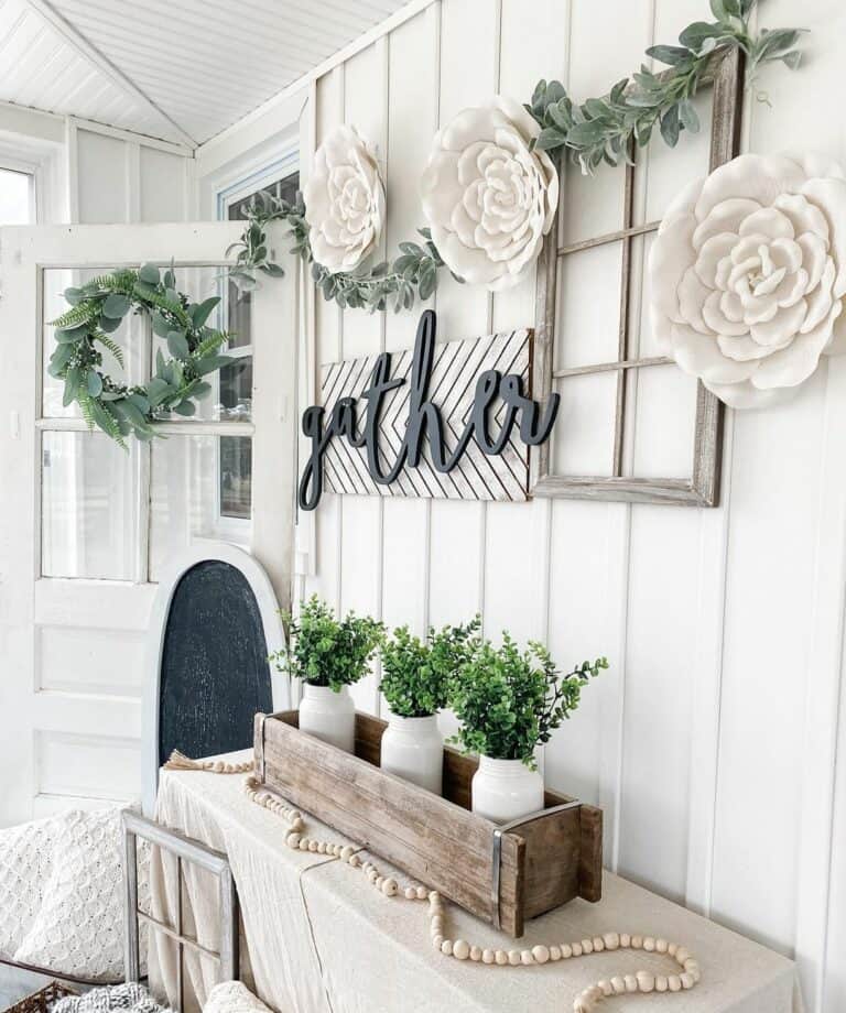 Country Cottage Sunroom With White Wall Flowers