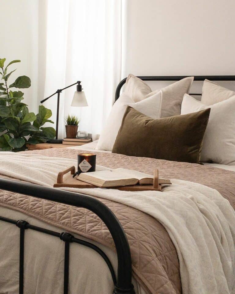Cozy Bedboom With Black Spindle Bed