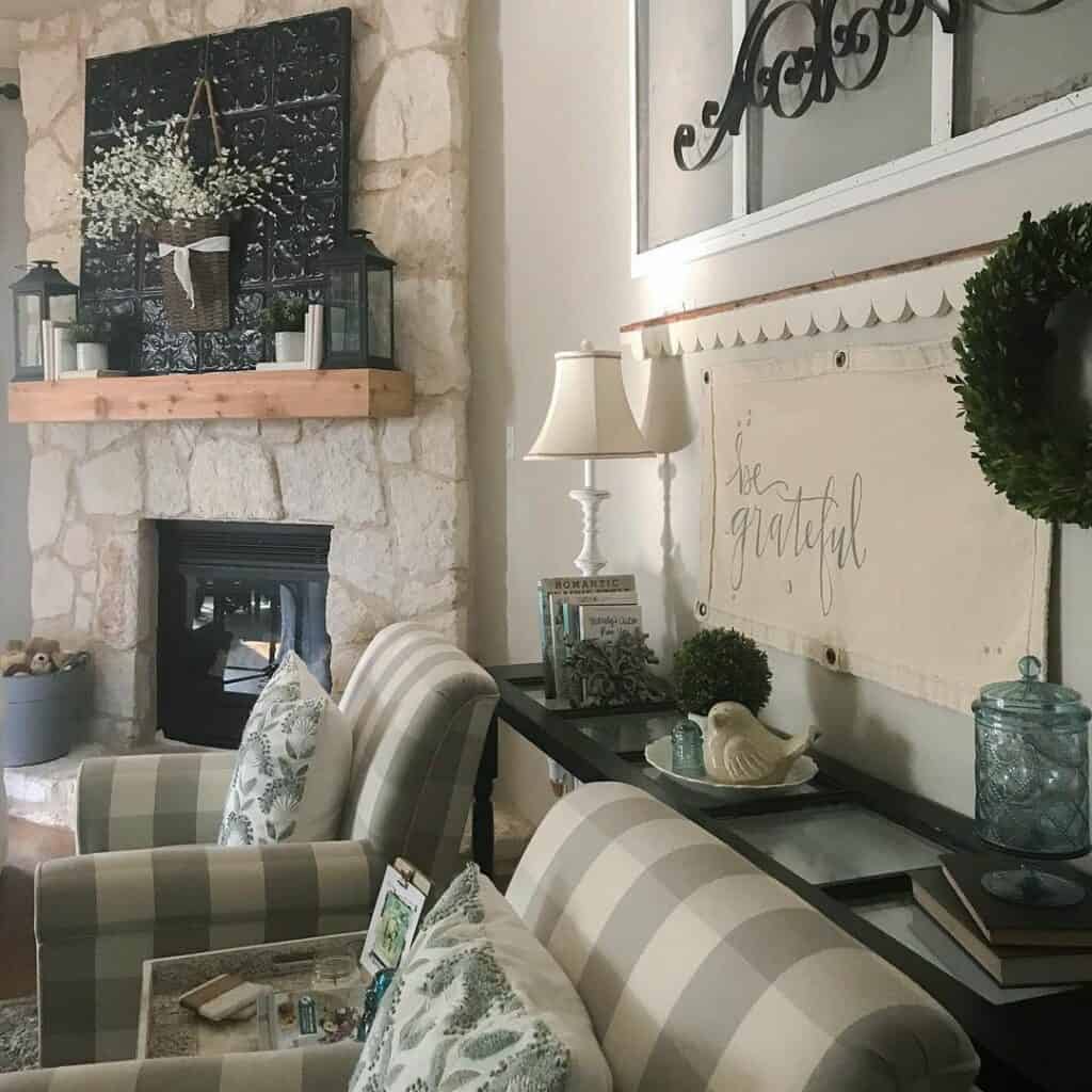 Cozy Gray and White Living Room With Stone Fireplace