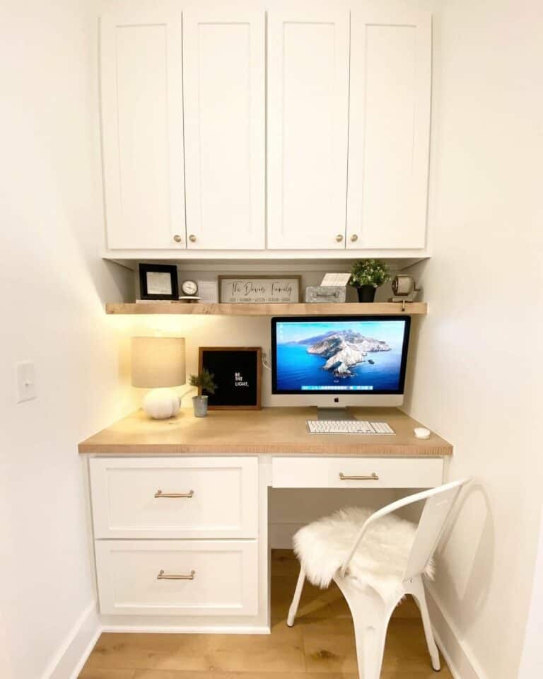 Cozy Home Office With Floating Shelf Above Desk
