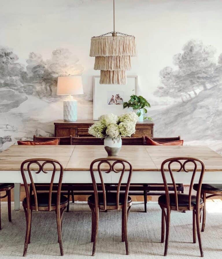 Dining Room With Gray Landscape Mural