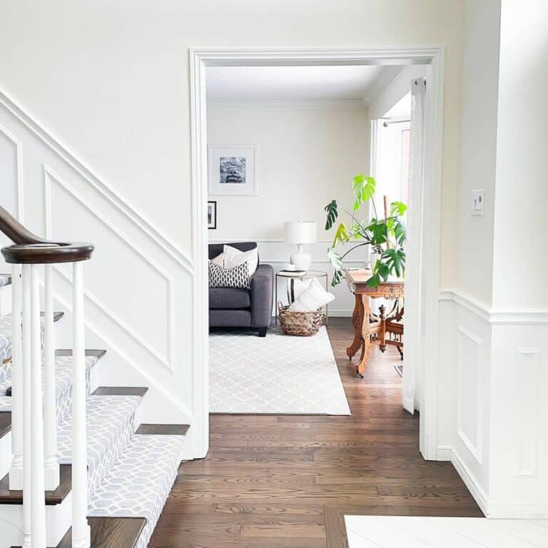 Entryway Features White and Wood Elements