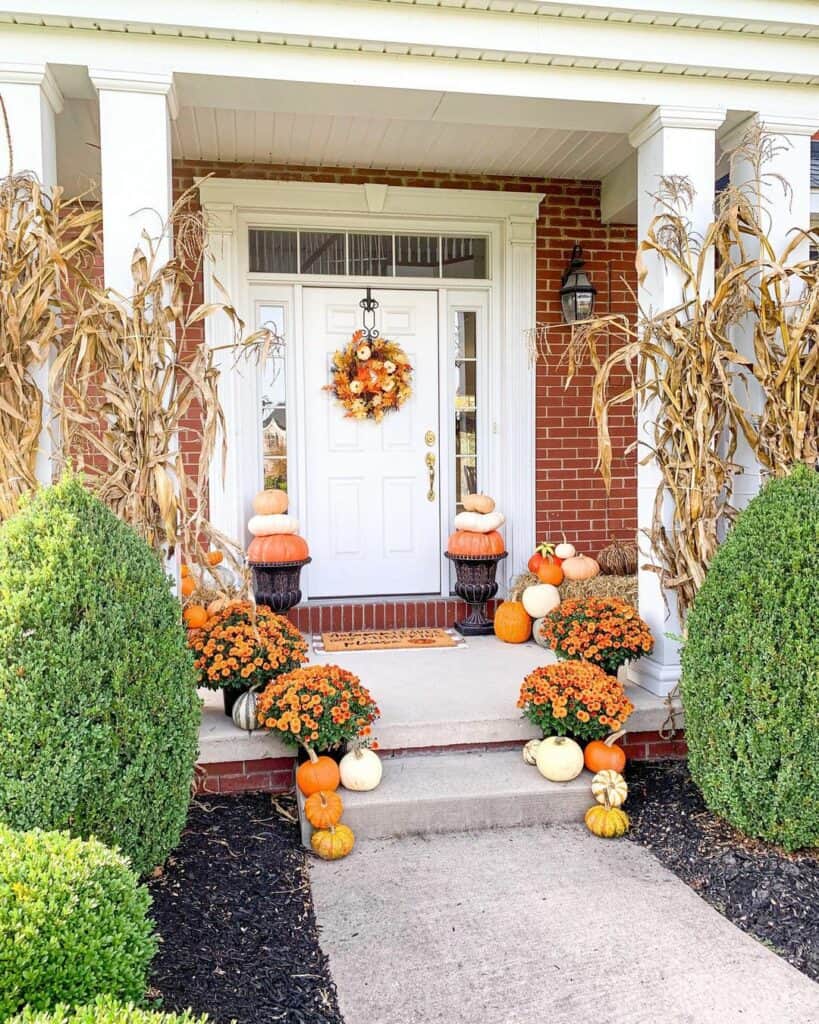 Farmhouse Front Porch With Orange Décor