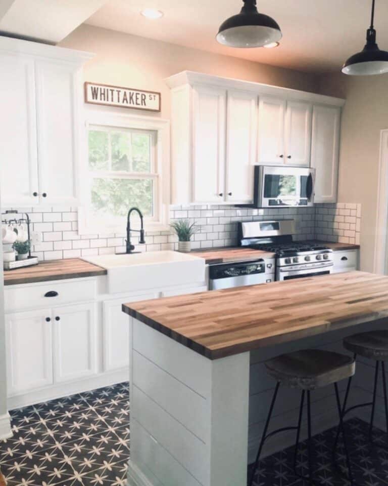 Farmhouse Kitchen With Black and White Patterned Tile Floor