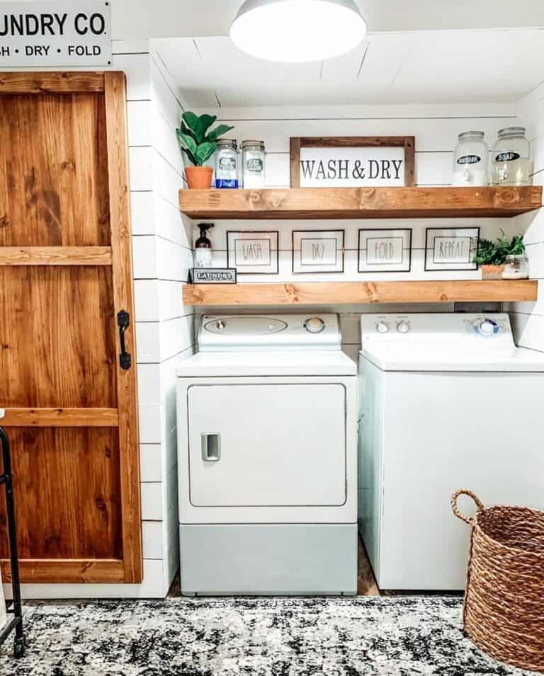 Farmhouse Laundry Nook With Stained Wood Accents