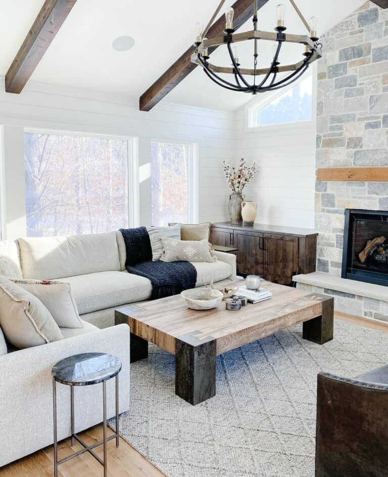 Farmhouse Living Room With Dark Wood Beams